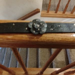 Black leather bracelet with rose